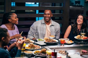 Family and friends enjoying a meal in a Benihana restaurant